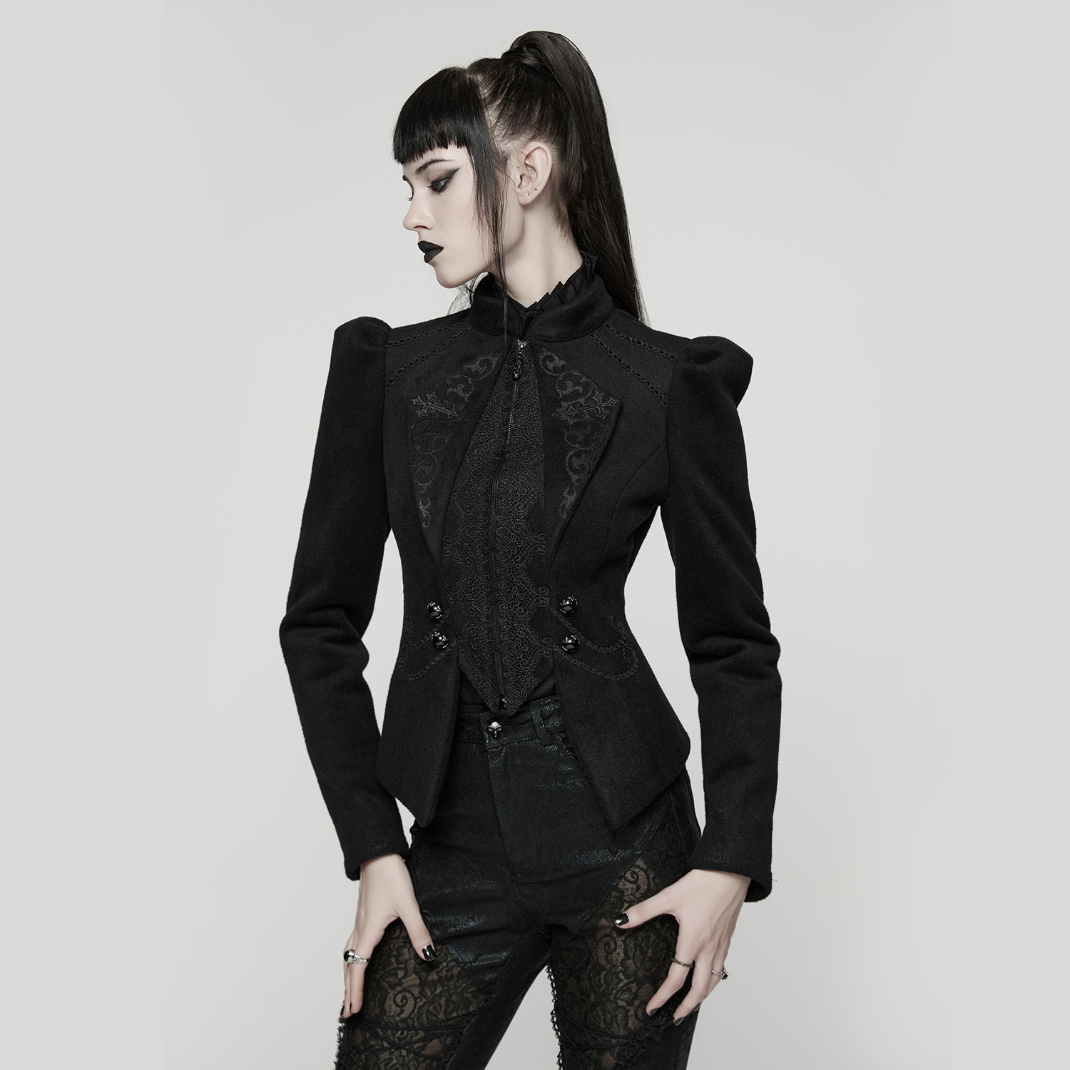 Main photo of model wearing the Punk Rave Goth Embroidered Woolen Coat, showcasing the structured wool-blend fabric, faux-vest front layer, and delicate tone-on-tone embroidered turn-down collar